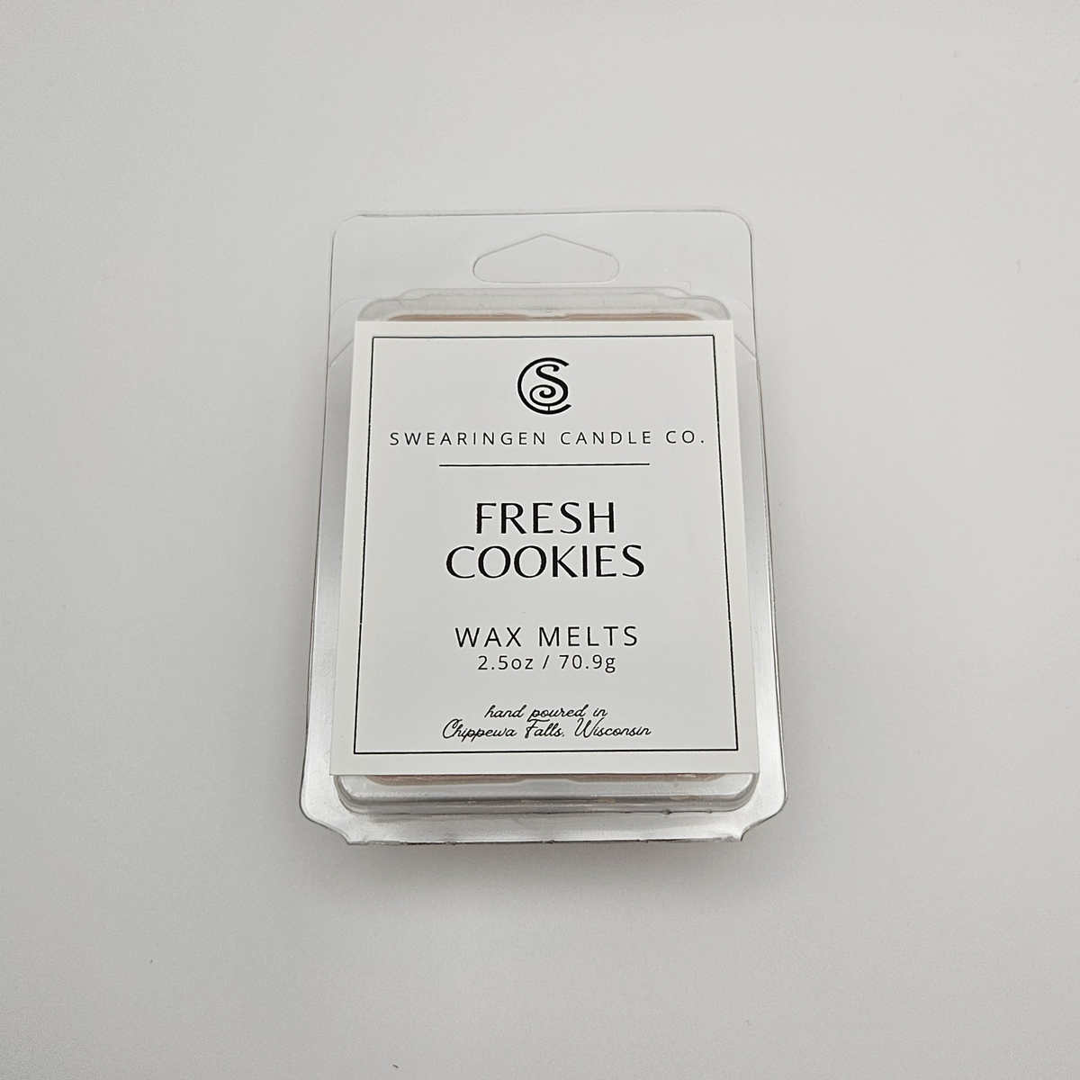 Fresh Cookies hand-poured parasoy wax melt tart in a clam shell container, shown from the front - Swearingen Candle Co.