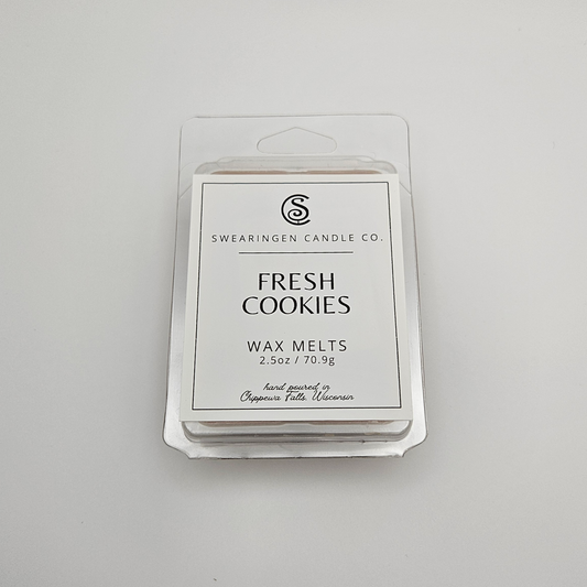 Fresh Cookies hand-poured parasoy wax melt tart in a clam shell container, shown from the front - Swearingen Candle Co.